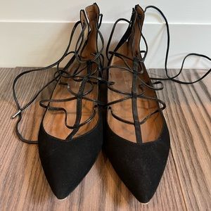 Aquazzura black suede lace up flats. Originally from BARNEYS Chicago.